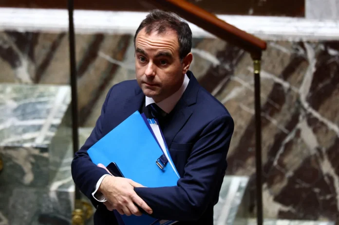 French PM forces budget through parliament without vote