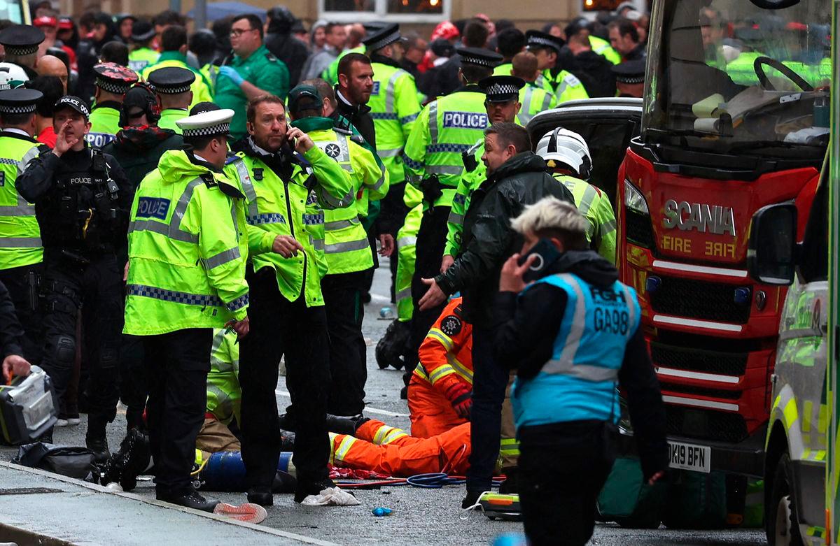47 injured after car rams into Liverpool fans, including four children 47 injured after car rams into Liverpool fans, including four children