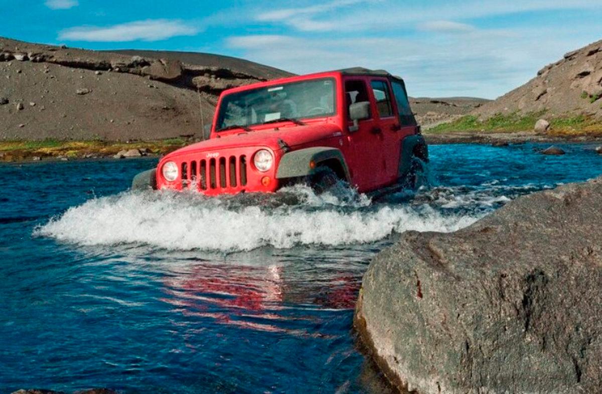 4WD driver feared swept away while crossing swollen river 4WD driver feared swept away while crossing swollen river