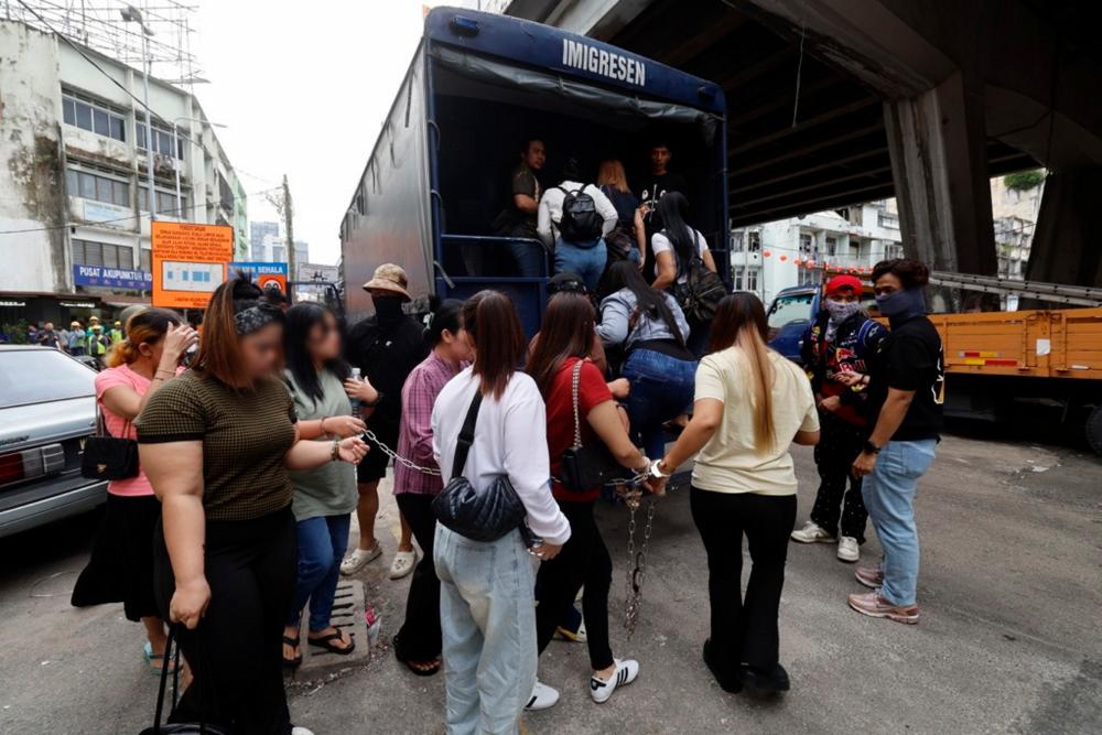 58 illegal immigrants arrested in Puchong food court raid 58 illegal immigrants arrested in Puchong food court raid