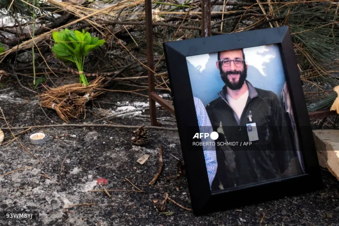 AFP__20260125__93WM8YJ__v1__Mockup__ProtestsAfterUsImmigrationOfficerKillsWomanInMin