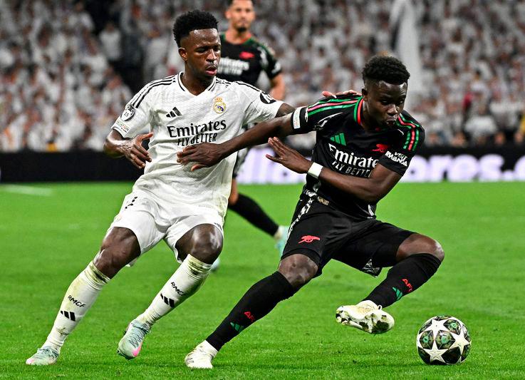 Arsenal oust holders Real Madrid to reach Champions League semis