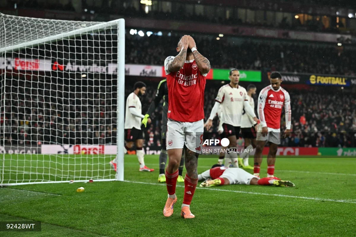 Arsenal miss chance to extend lead in Liverpool stalemate