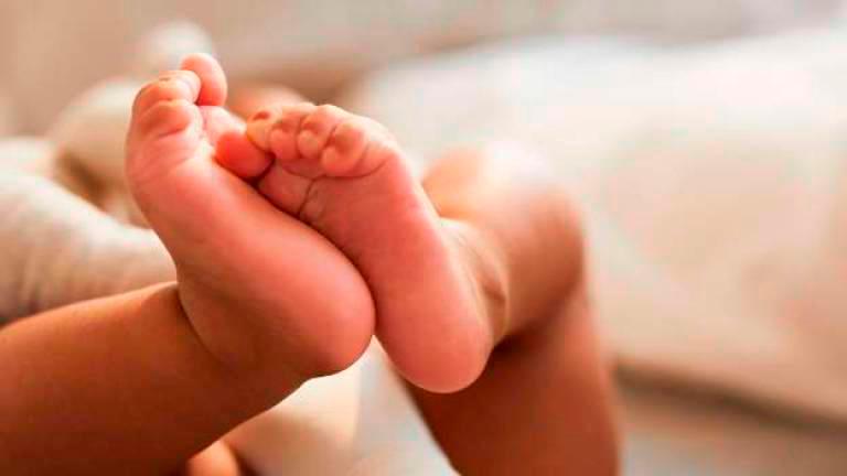 Baby girl abandoned in front of house in Simpang Empat