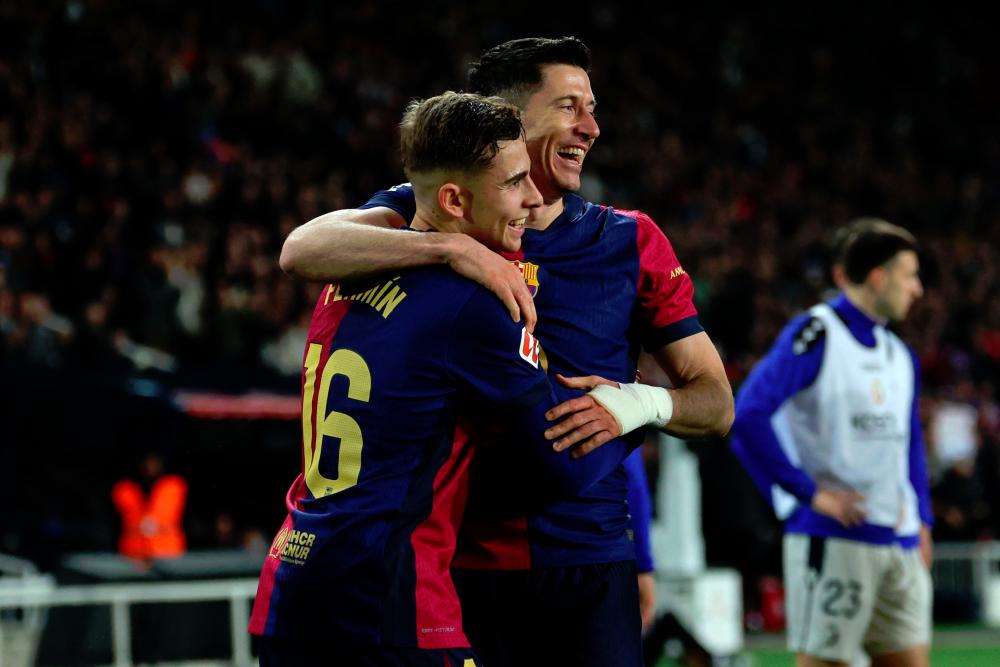 Barca bolster Liga title bid by winning match they didn’t want to play
