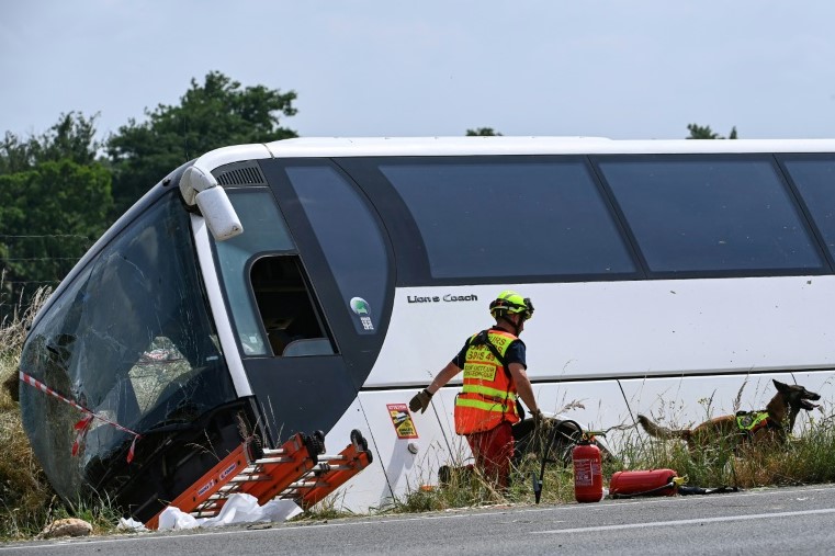Bus carrying Ukrainian students overturns in France, killing 4 Bus carrying Ukrainian students overturns in France, killing 4