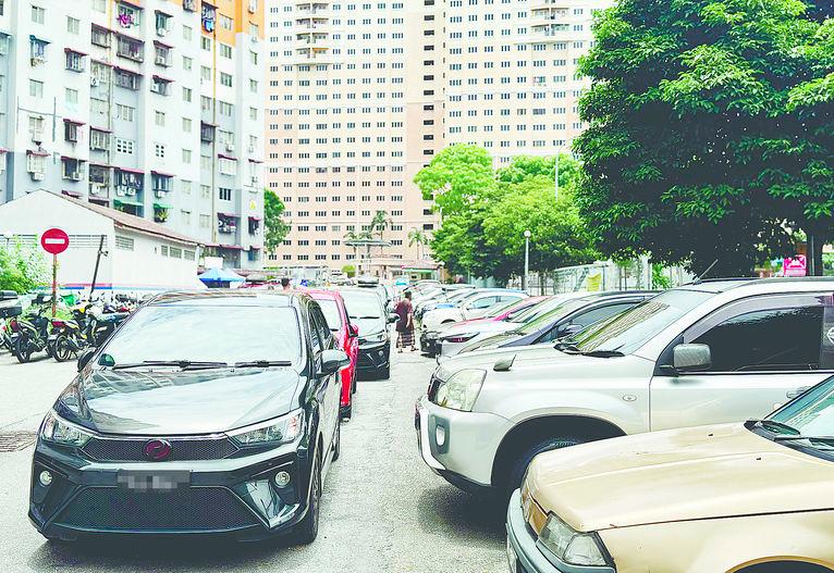 Call for stricter measures to curb double-parking bane