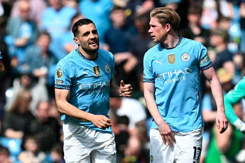 De Bruyne leads Man City comeback, Arsenal held by Brentford De Bruyne leads Man City comeback, Arsenal held by Brentford