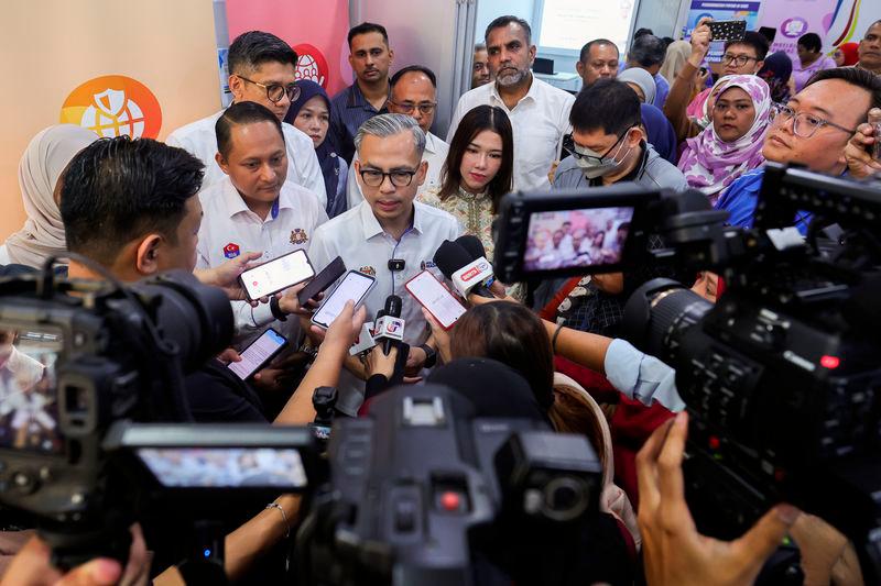 Detention of Sin Chew Daily editors in accordance with law - Fahmi