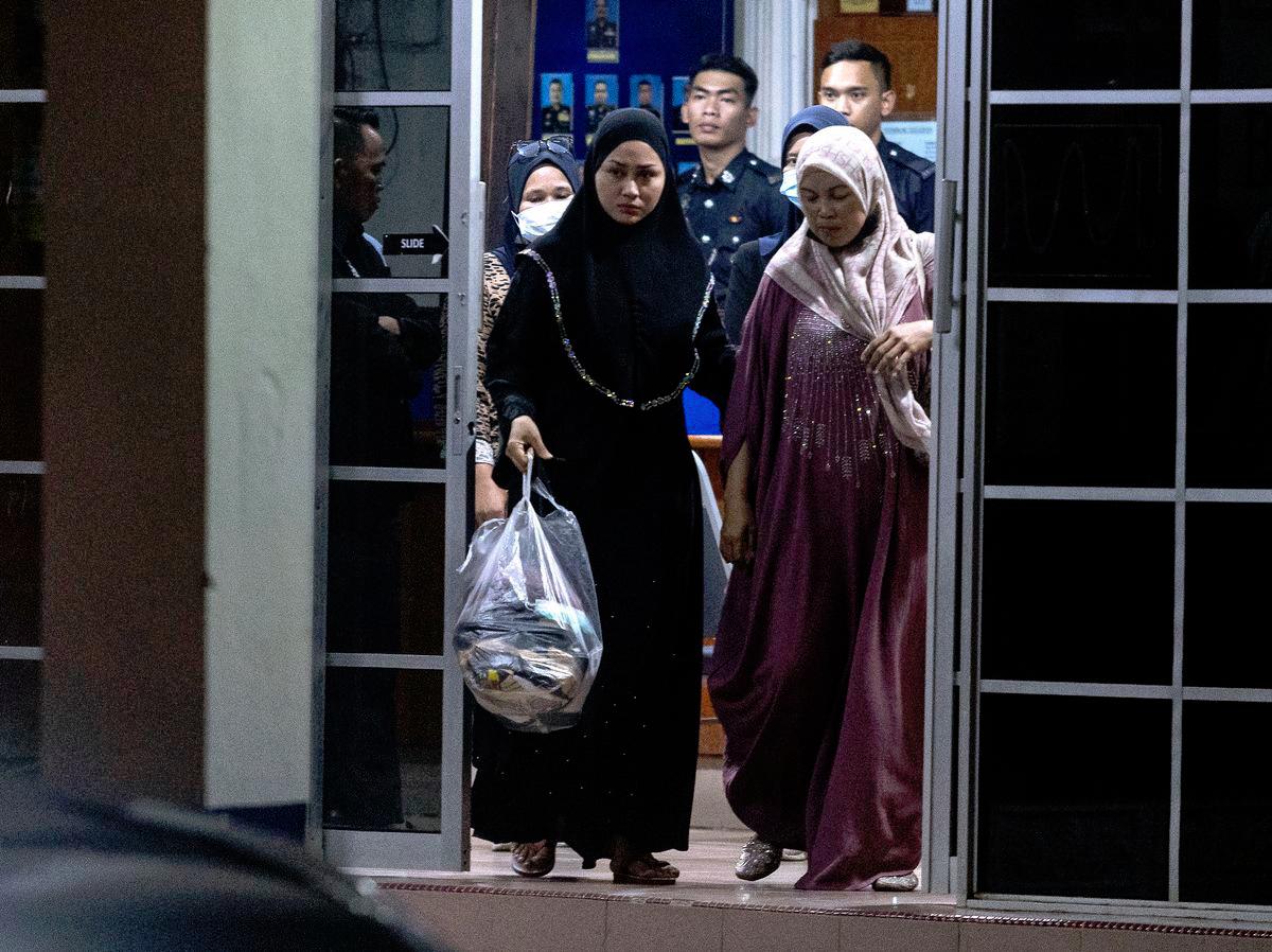 Eda Ezrin and Aida Mamat return home after police statements Eda Ezrin and Aida Mamat return home after police statements