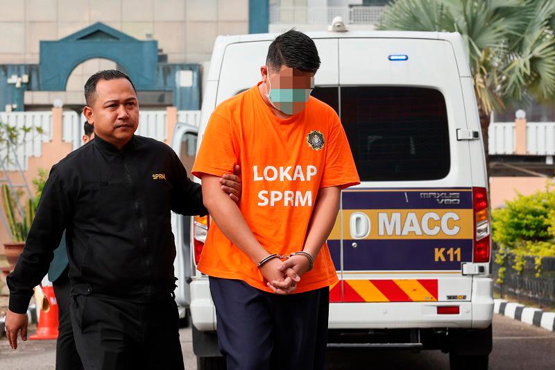 Enforcement officer remanded in bribery probe Enforcement officer remanded in bribery probe