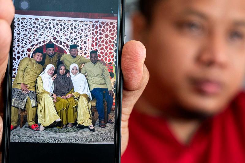 First and last family studio portrait of sewage hole victim, says brother
