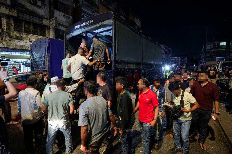 Foreigners hide in ceiling to avoid arrest by Immigration Dept