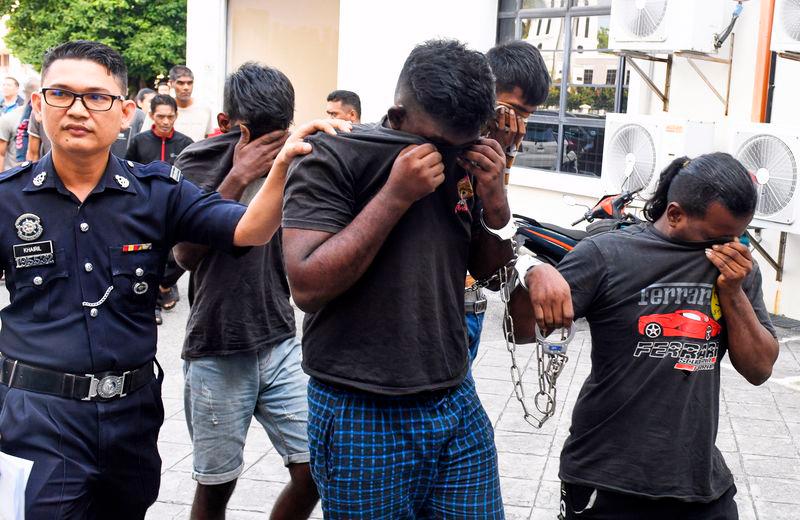 Four men charged with extorting RM18,000 from an individual Four men charged with extorting RM18,000 from an individual