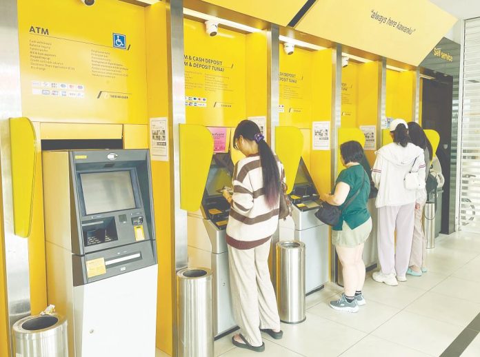 Fresh call for abolition of RM1 ATM fee Fresh call for abolition of RM1 ATM fee