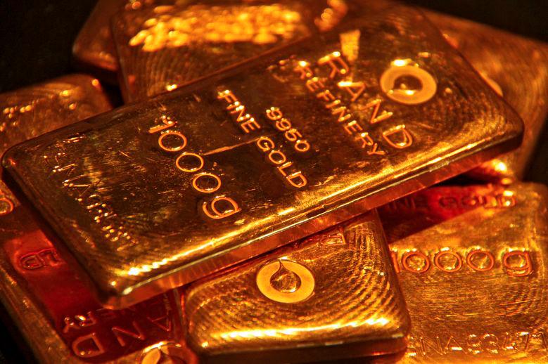 Gold bounces off nearly four-week low on dip-buying