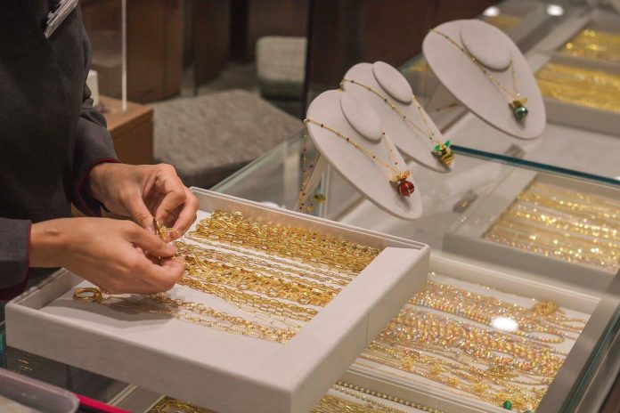 Gold slightly recovers from over one-week low