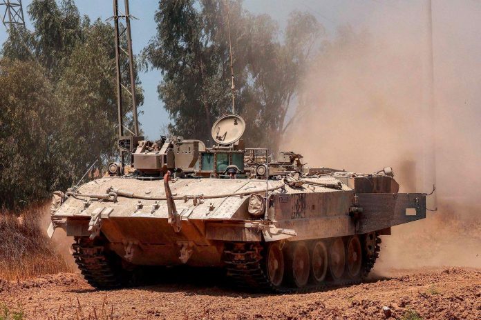 Hamas armed wing says Israeli army besieged location of hostage Matan Zangauker