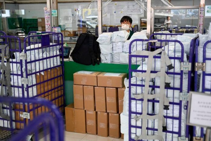 Hong Kong's postal service says to stop shipping US-bound goods Hong Kong's postal service says to stop shipping US-bound goods
