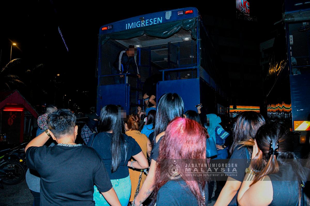 Immigration swoops on 'Dugem' nightspot packed with foreigners in Pudu and callgirls hotspot in Klang