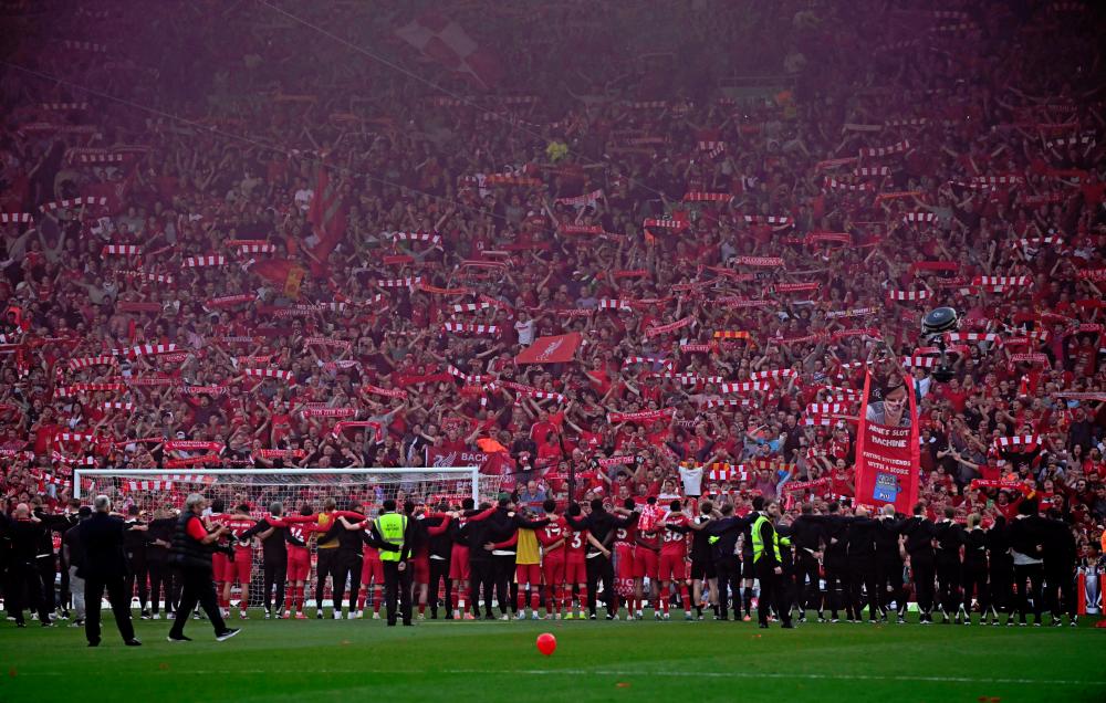Imperious Liverpool smash Tottenham to win Premier League title Imperious Liverpool smash Tottenham to win Premier League title