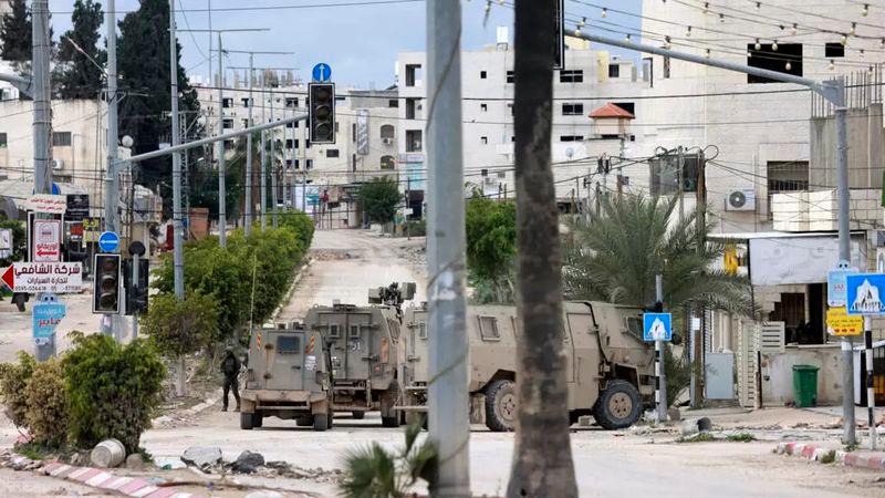 Israel says army to stay in evacuated West Bank camps for 'coming year' Israel says army to stay in evacuated West Bank camps for 'coming year'