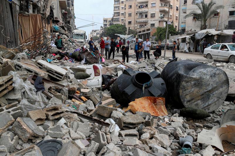 Israeli fire kills at least 10 people in Gaza, hits a police station Israeli fire kills at least 10 people in Gaza, hits a police station
