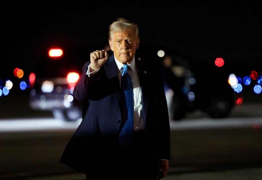 Japan 'deeply concerned' at global impact of Trump tariffs: minister