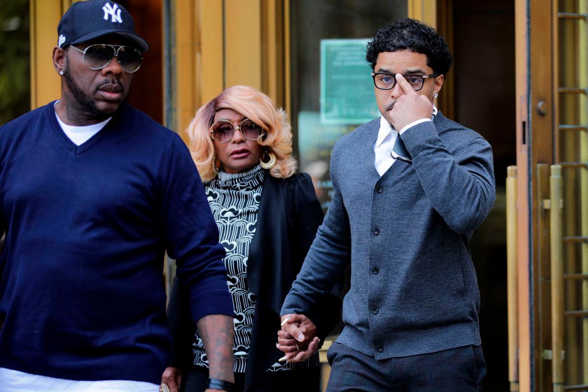 Judge scolds Sean Combs after he nods at jurors