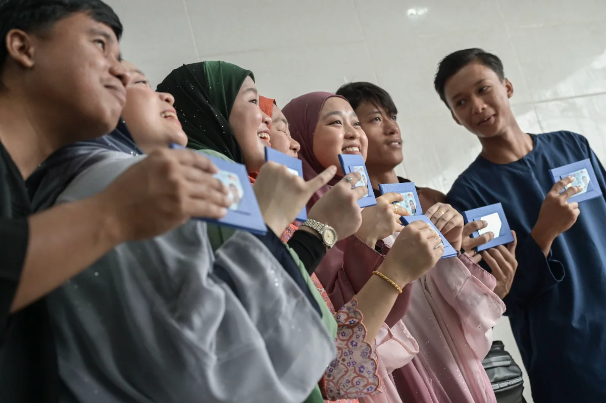 Seven siblings receive identity cards after lifetime without documentation