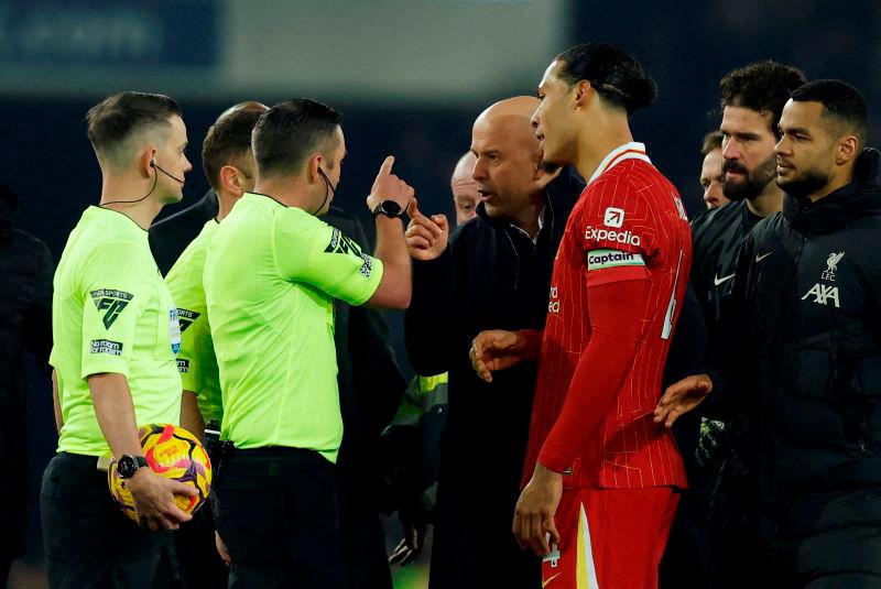 Liverpool boss Slot charged after clashing with officials Liverpool boss Slot charged after clashing with officials