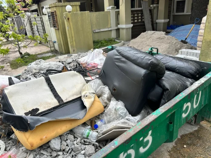 M'sian frustrated after people dump sofa, food waste into renovation bin