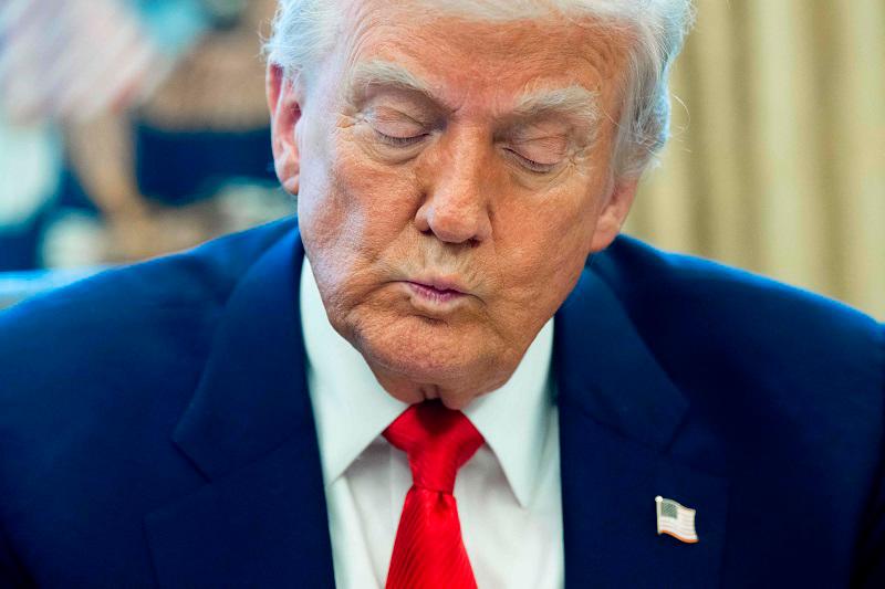 Man charged with Trump assassination threat, Justice Dept says Man charged with Trump assassination threat, Justice Dept says
