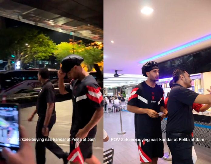 Manchester United’s Joshua Zirkzee spotted queuing for nasi kandar at 3am in KL