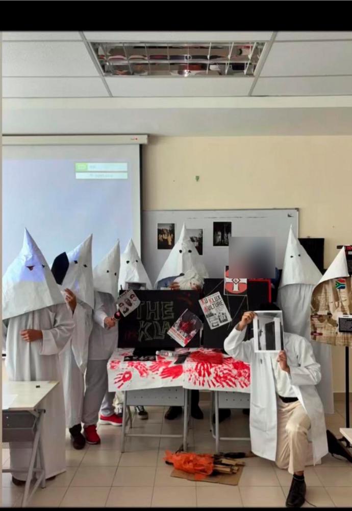 M’sians outraged after UITM Dengkil students don KKK robes for assignment M’sians outraged after UITM Dengkil students don KKK robes for assignment