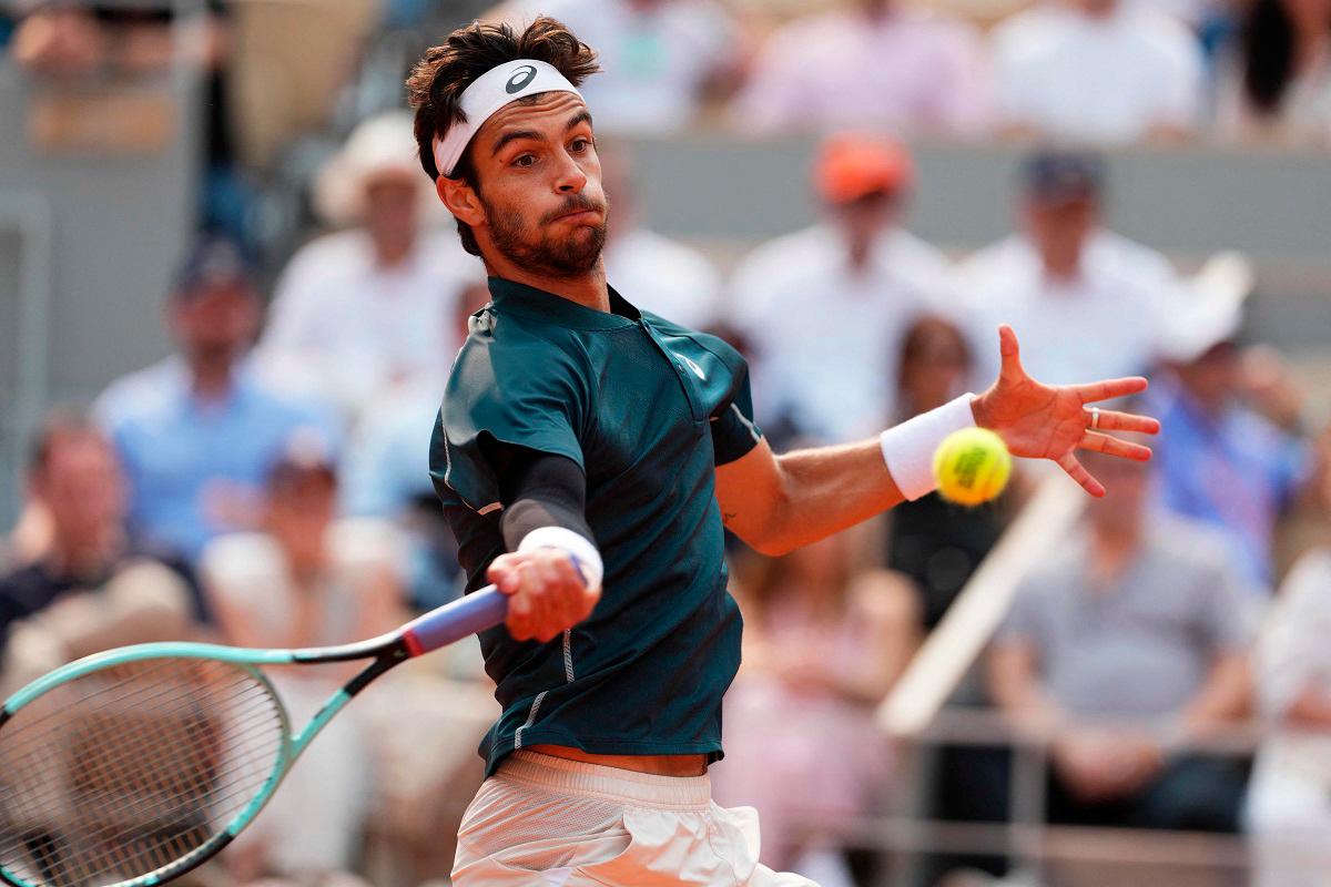 Musetti fights past Tiafoe to meet Alcaraz in French Open semis Musetti fights past Tiafoe to meet Alcaraz in French Open semis