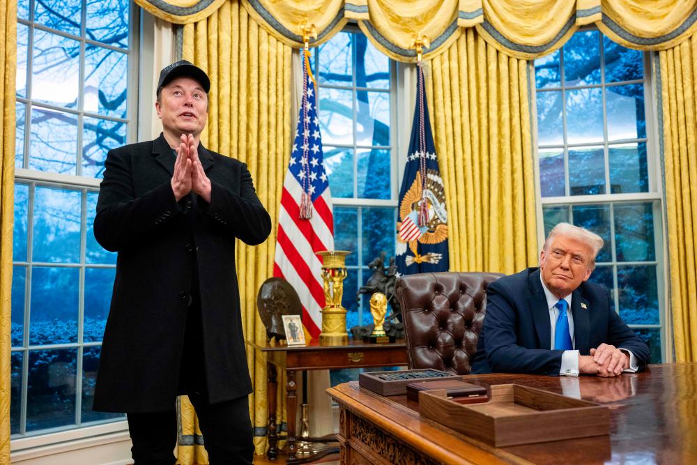 Musk, with Trump at White House, says US will go 'bankrupt' without cuts
