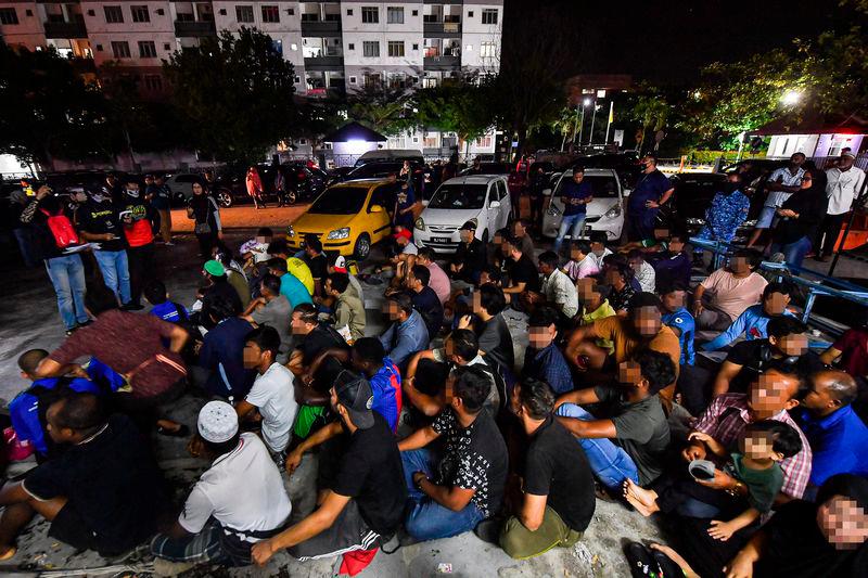 Op Sasar: JIM detains 129 illegal immigrants at Cyberjaya construction site Op Sasar: JIM detains 129 illegal immigrants at Cyberjaya construction site