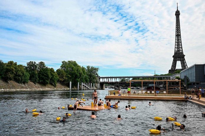 Paris Seine swimming draws 35,000 despite rainy July