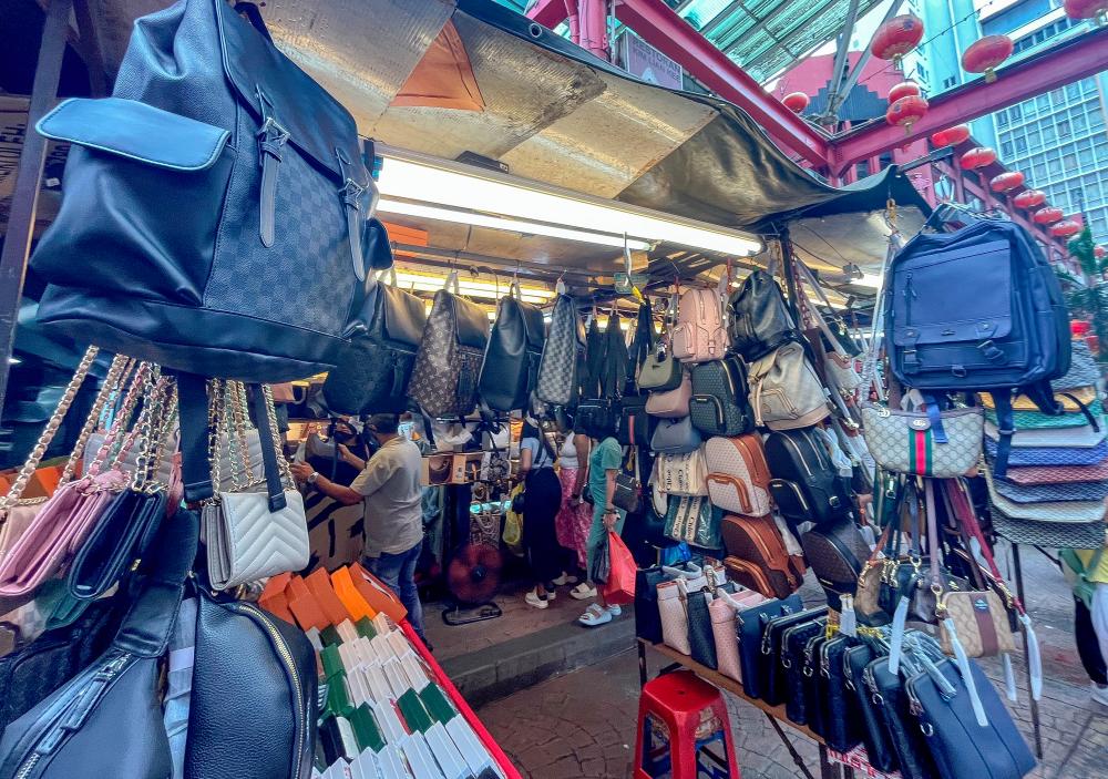 Petaling Street bust: 5,500 fake goods worth RM360k seized Petaling Street bust: 5,500 fake goods worth RM360k seized