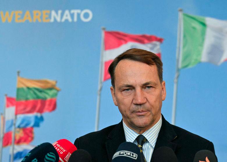 Poland says Trump committed to NATO and will be at Hague summit Poland says Trump committed to NATO and will be at Hague summit