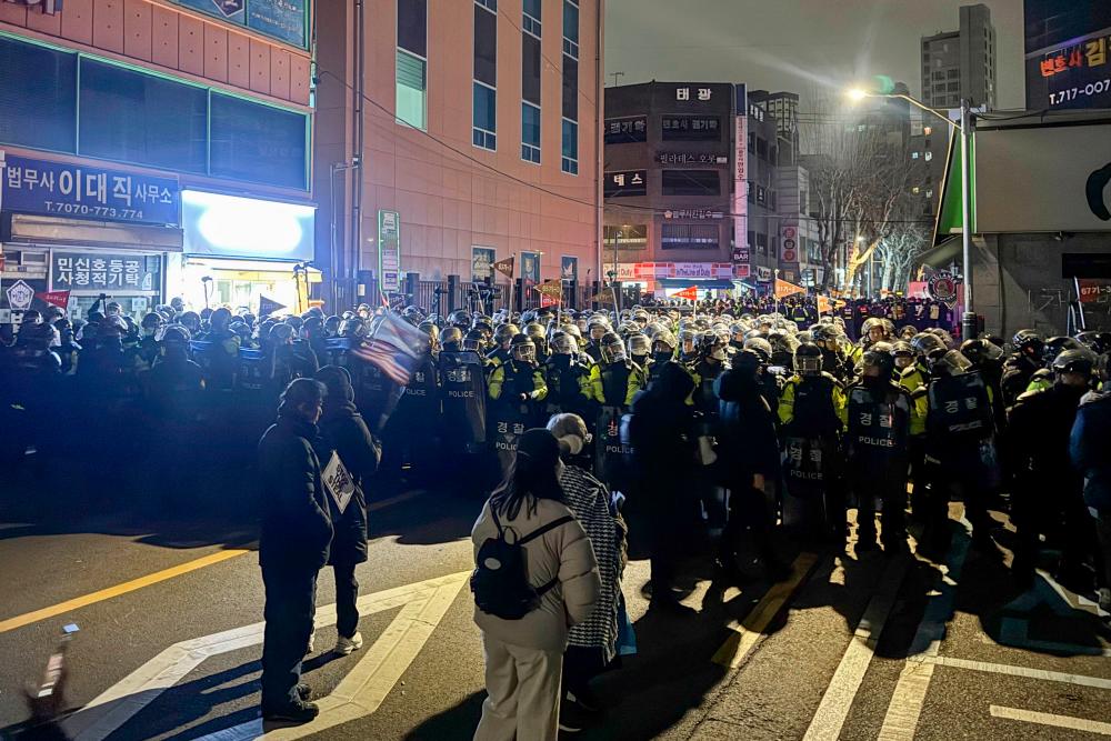 Protesters storm South Korea court after it extends Yoon’s detention
