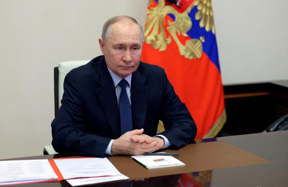 Putin says ignoring Soviet role in liberation of Nazi death camps is shameful Putin says ignoring Soviet role in liberation of Nazi death camps is shameful