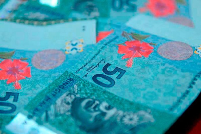Ringgit opens higher against greenback Amid cautious sentiment 