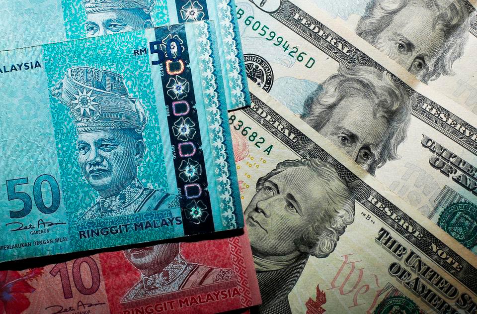 Ringgit opens marginally higher vs US dollar, sentiment remains cautious