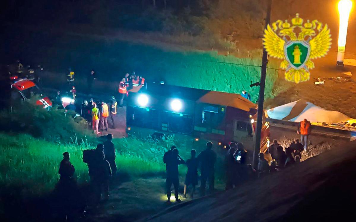 Russia bridge collapse onto railway kills at least 7: governor Russia bridge collapse onto railway kills at least 7: governor