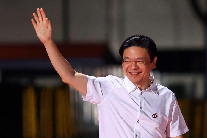 Singapore PM makes cabinet shakeup, local media says