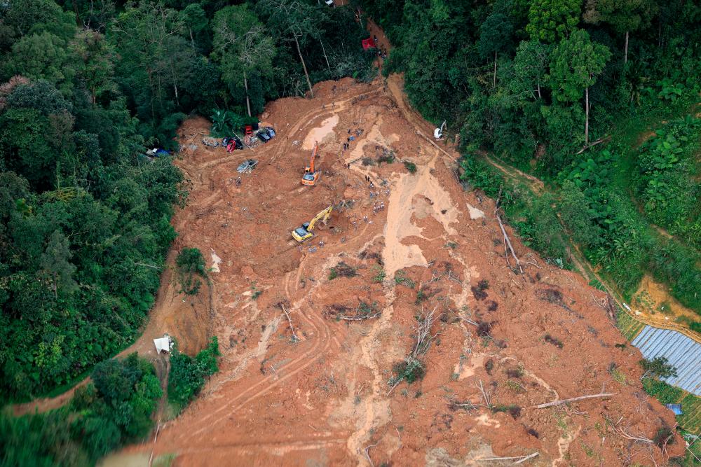 Six feared buried alive in Miri landslide Six feared buried alive in Miri landslide