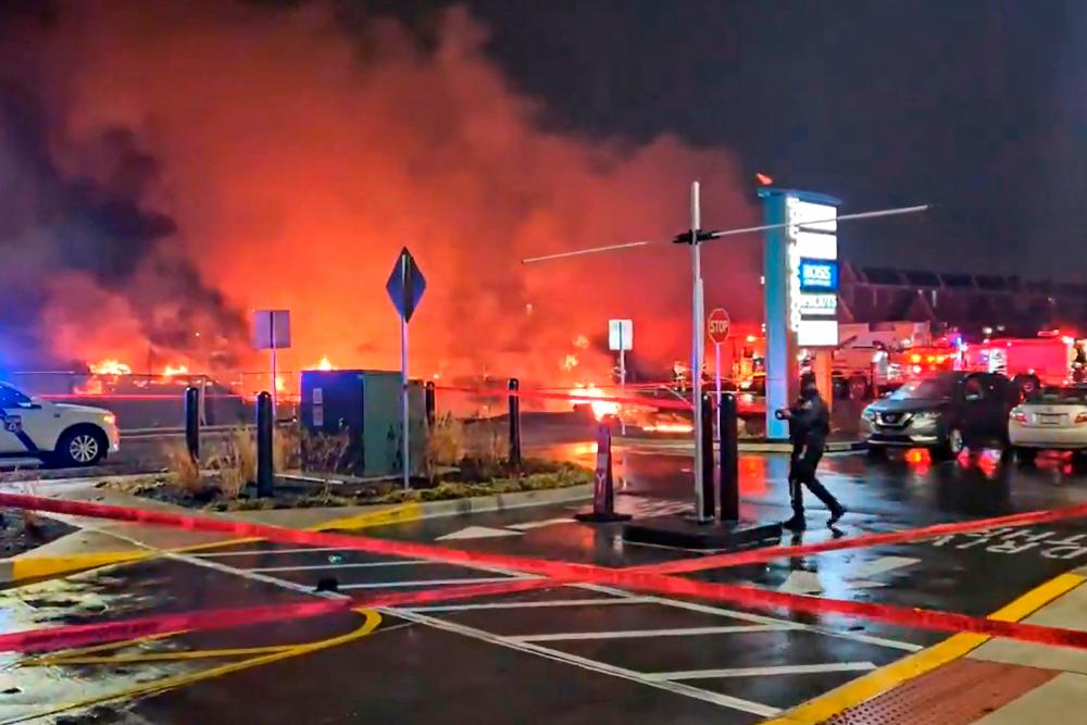 Small plane crashes in Philadelphia, sparking fire on the ground