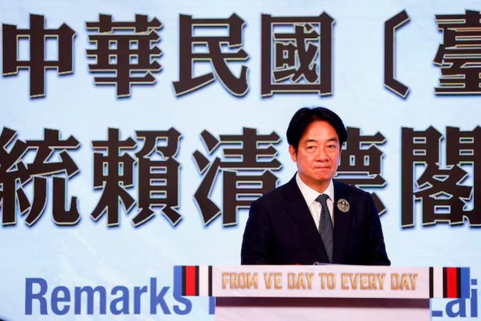 Taiwan president pledges peace with China but says island must strengthen defences